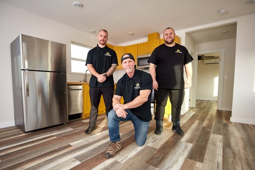 Anchored Tiny Homes Leadership team standing in kitchen